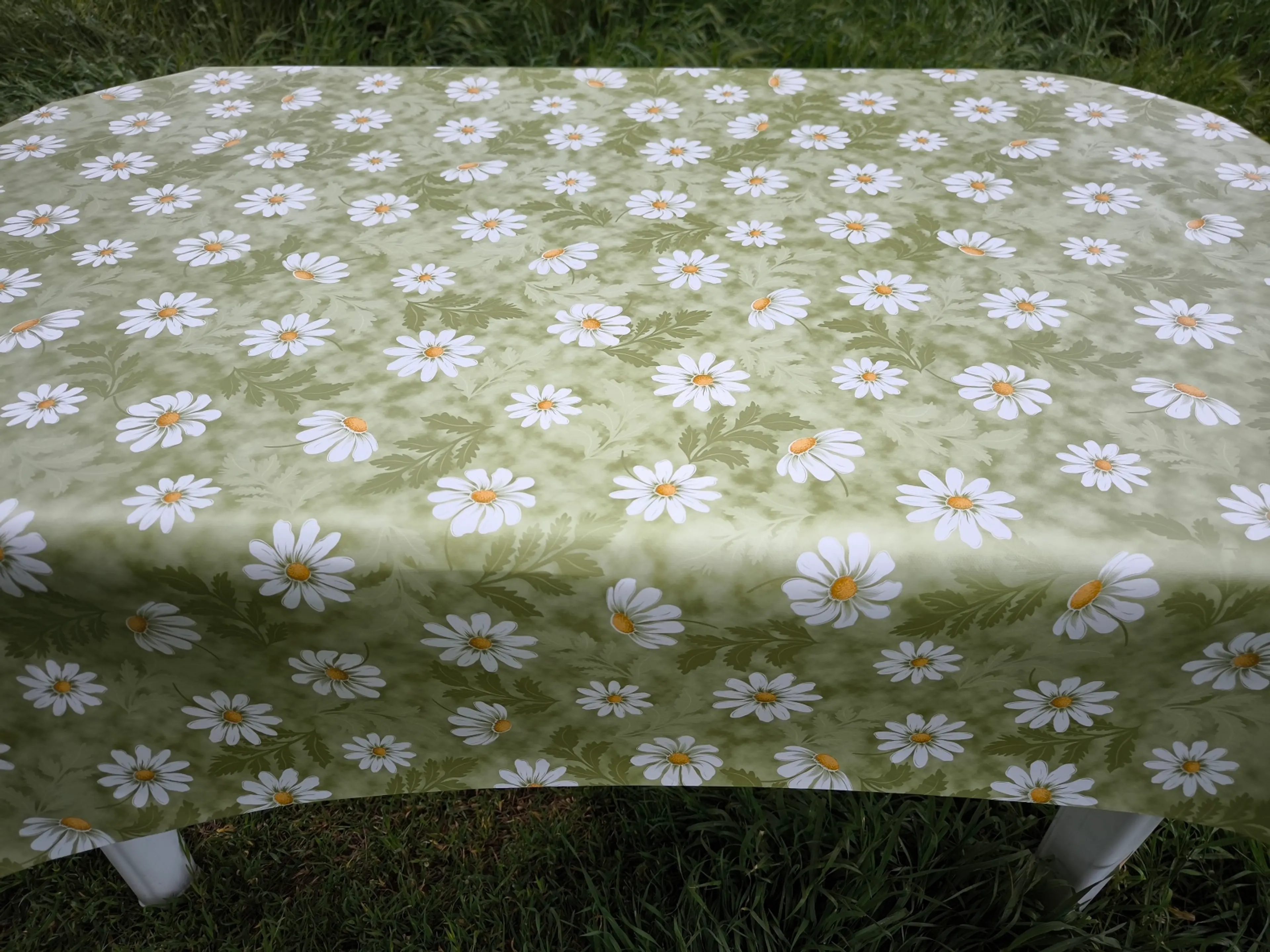 Мушама за маса, зелена маргаритка 140см 10м